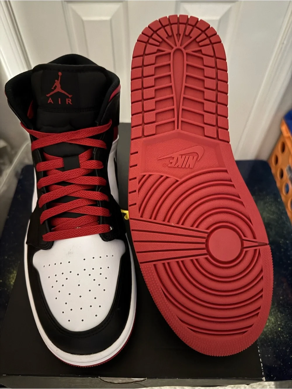 Air Jordan 1 Mid Sneakers in Black, White, Red